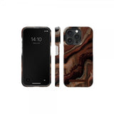 Ideal of Sweden iPhone 15 Pro Cover Fashion Case MagSafe Dark Amber Marble