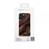 Ideal of Sweden iPhone 15 Cover Fashion Case MagSafe Dark Amber Marble